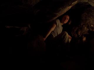 Jeanie in the cave at Wat Tham Mongkon Thong.